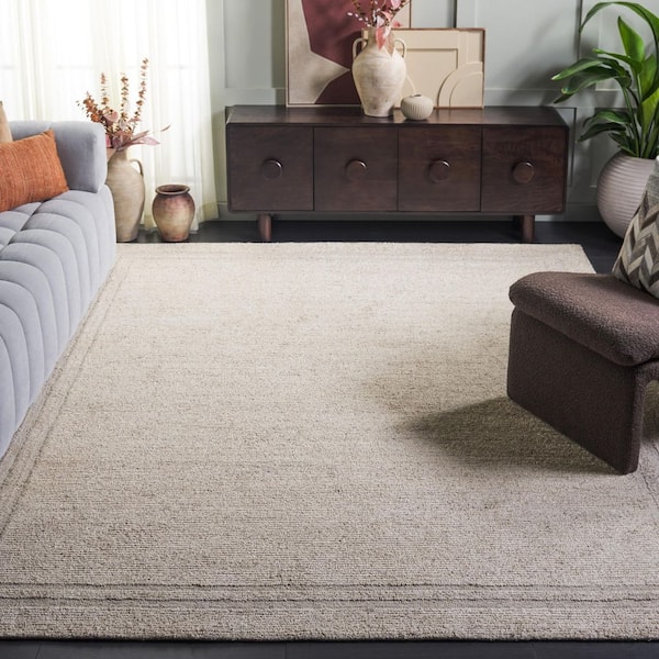 Renewal 8 ft. x 10 ft. Light Beige Solid Border Area Rug
