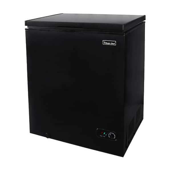 Small chest freezer that rolls out underneath countertop. Locks in