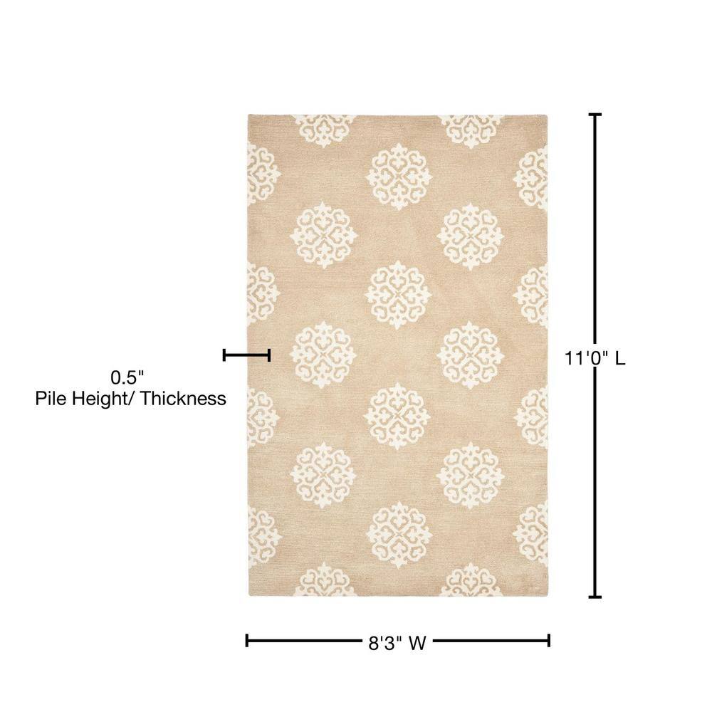 Beige and Ivory Tufted Wool and Viscose 9' x 12' Area Rug