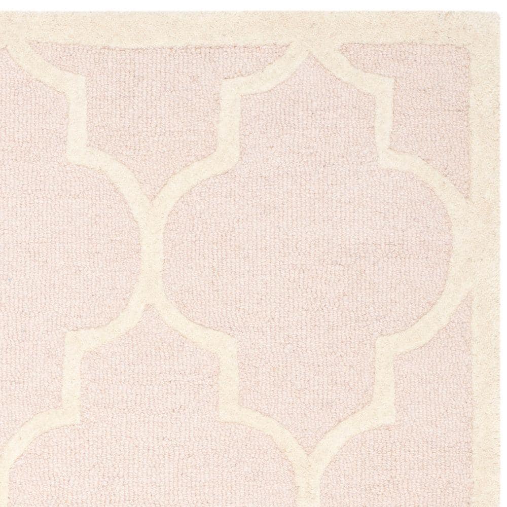 Light Pink and Ivory Hand-Tufted Wool 4' x 6' Area Rug