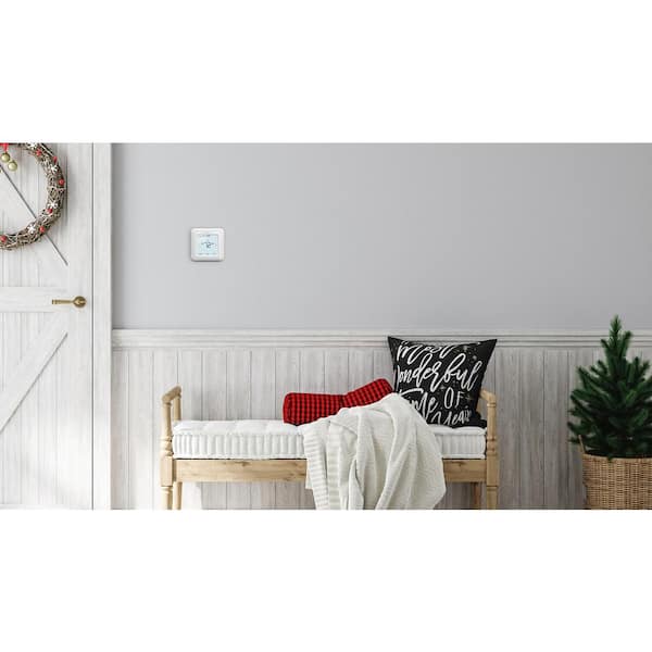 https://images.thdstatic.com/productImages/1434cdbc-5505-4099-a12f-413a6f7cf2c5/svn/honeywell-home-programmable-thermostats-rth8560d-4f_600.jpg