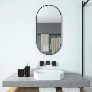 18 in. W. x 36 in. H Oval Framed Wall Bathroom Vanity Mirror in Matte Black