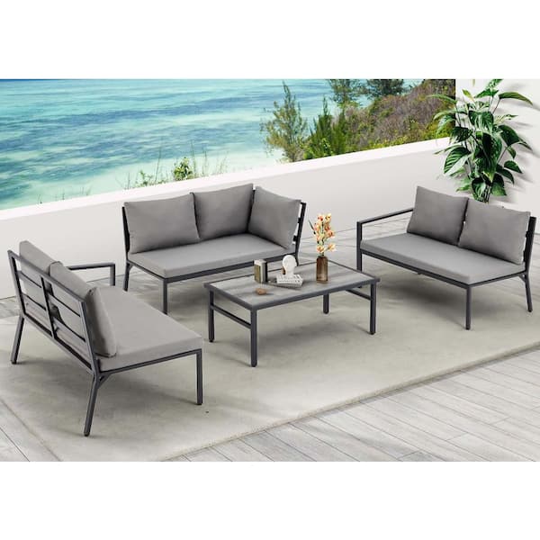 Zeus & Ruta 4-Piece Black Aluminum Outdoor Conversation Set with Light Gray Cushions and 1-Wood Top Coffee Table