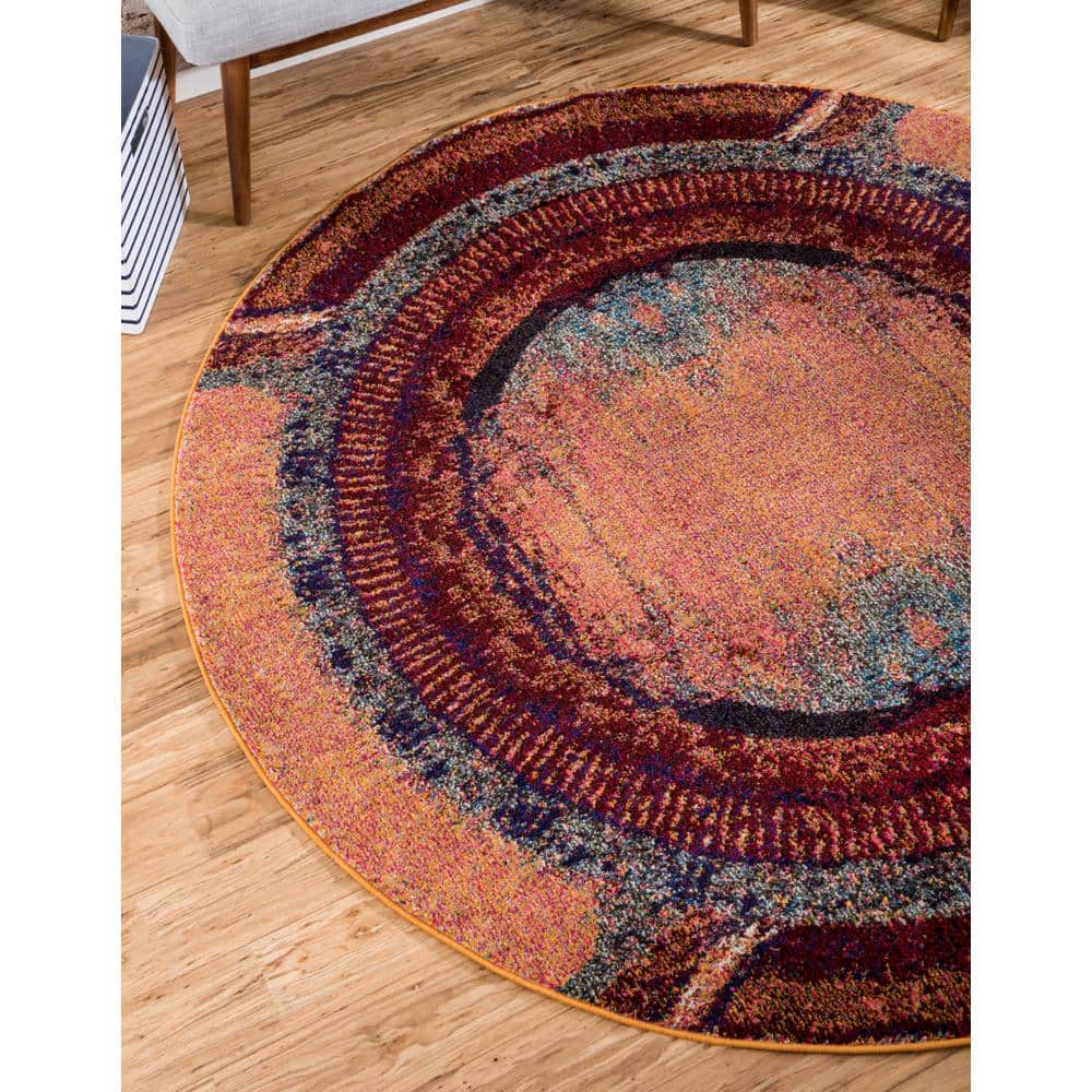 6' Round Orange and Black Abstract Synthetic Rug