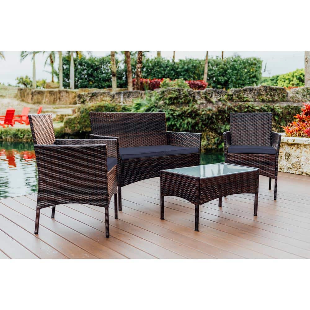 4-Piece Brown Wicker Outdoor Seating Set with Blue Cushions