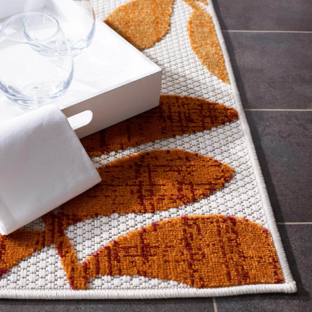 Red and Cream Floral Synthetic Indoor/Outdoor Area Rug