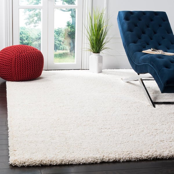 Milan Solid Shag 8 ft. x 10 ft. Ivory Living Room/Bedroom Area Rug