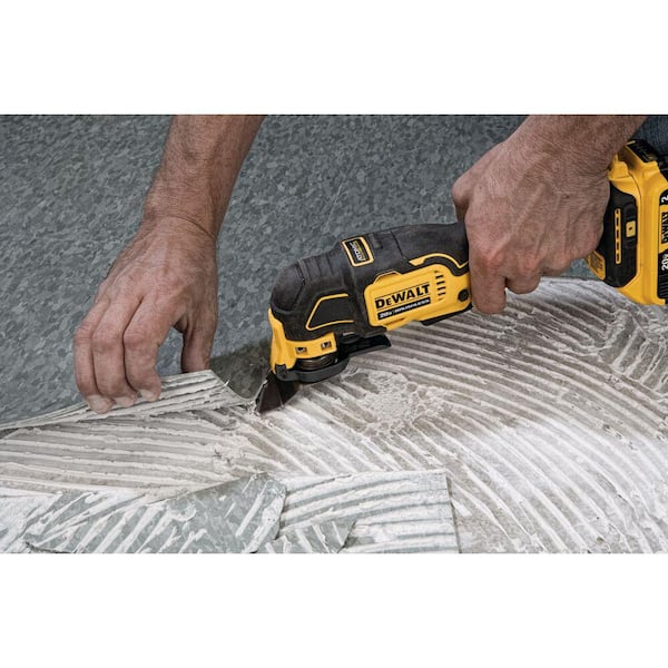 DEWALT ATOMIC 20V MAX Cordless Brushless Oscillating Multi Tool, (1) 20V  2.0Ah MAX Li-Ion Battery, and Charger DCS354BWDCB203C The Home Depot