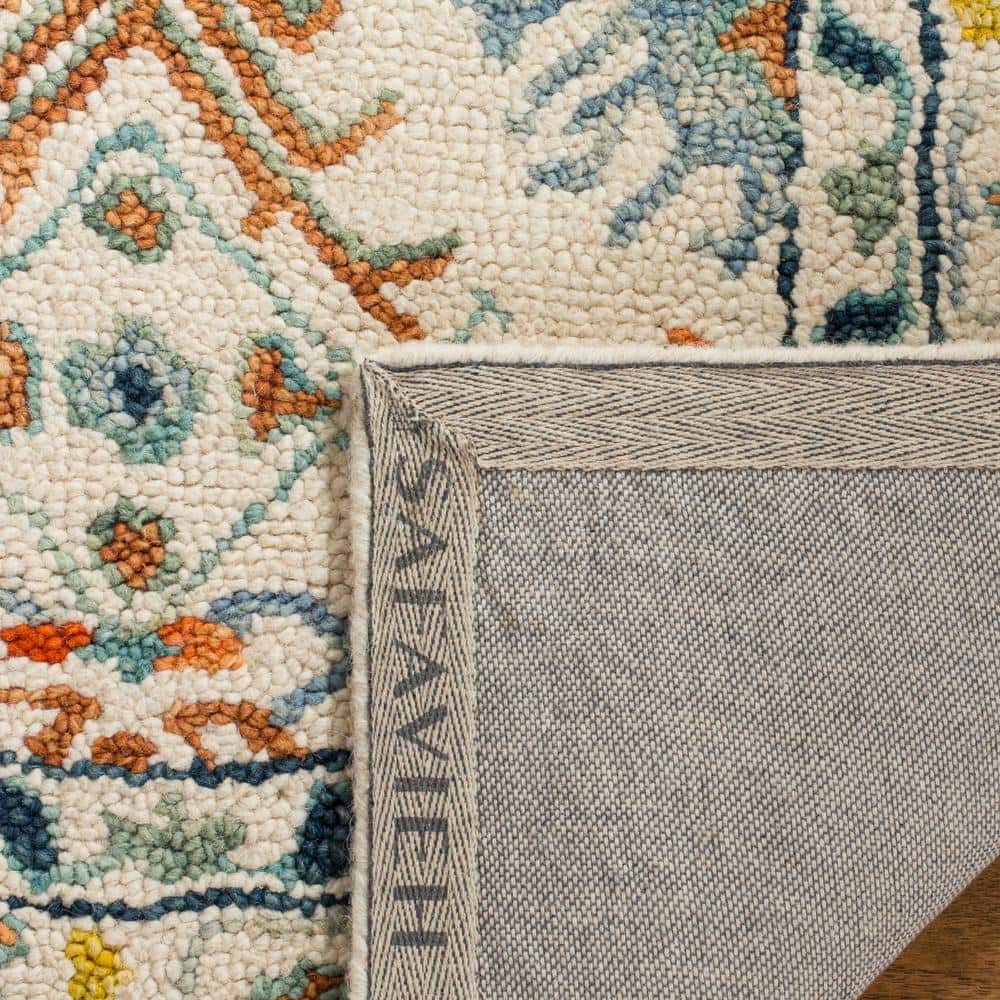 Handmade Rustic-Chic Blue Floral Wool Area Rug - 6' x 9'