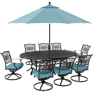 Traditions 9-Piece Aluminum Outdoor Dining Set with Blue Cushions, 8 Swivel Rockers, Cast-Top Table, Umbrella and Base