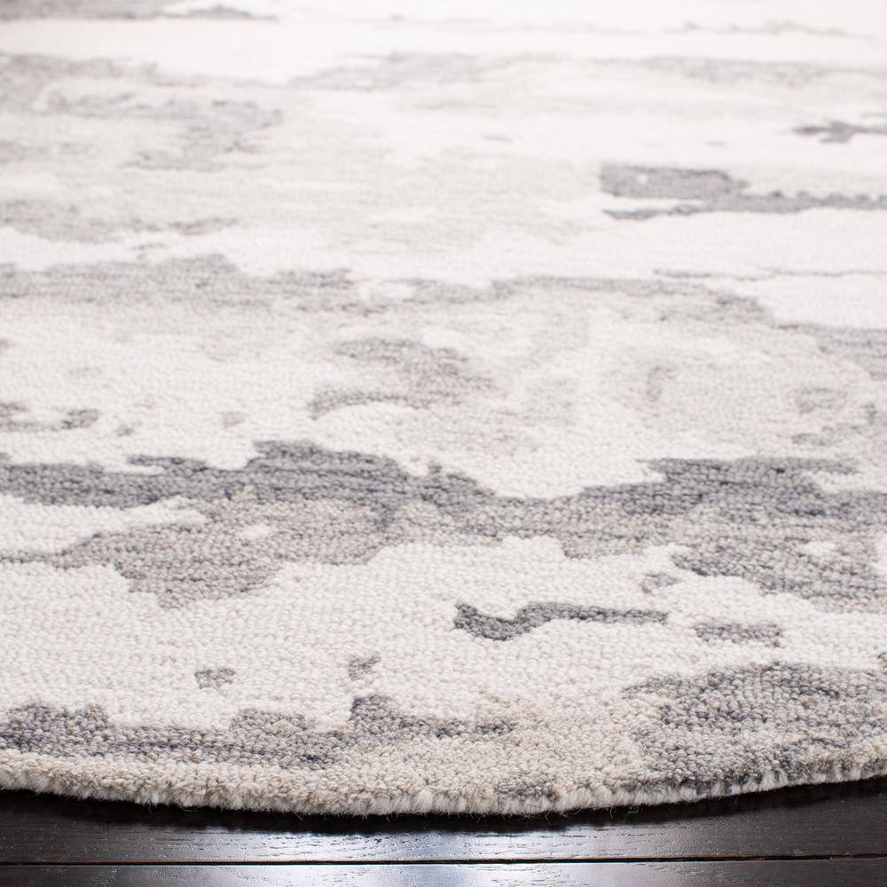 Handmade Tufted Charcoal/Ivory Round Wool Area Rug