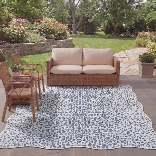Courtyard 8 ft. x 10 ft. Ivory/Navy Cheetah Geometric Indoor/Outdoor Area Rug