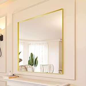 48 in. W x 36 in. H Gold Aluminum Rectangle Framed Tempered Glass Wall-mounted Mirror