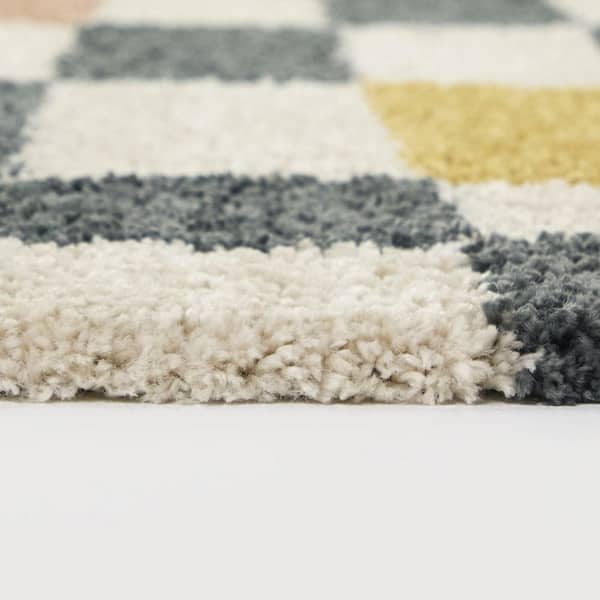 Theron Cream 5 ft. 3 in. x 7 ft. Geometric Area Rug