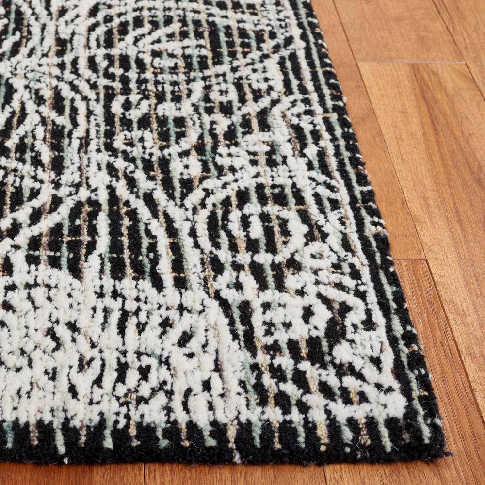 Handmade Black Wool 6' x 9' Tufted Area Rug
