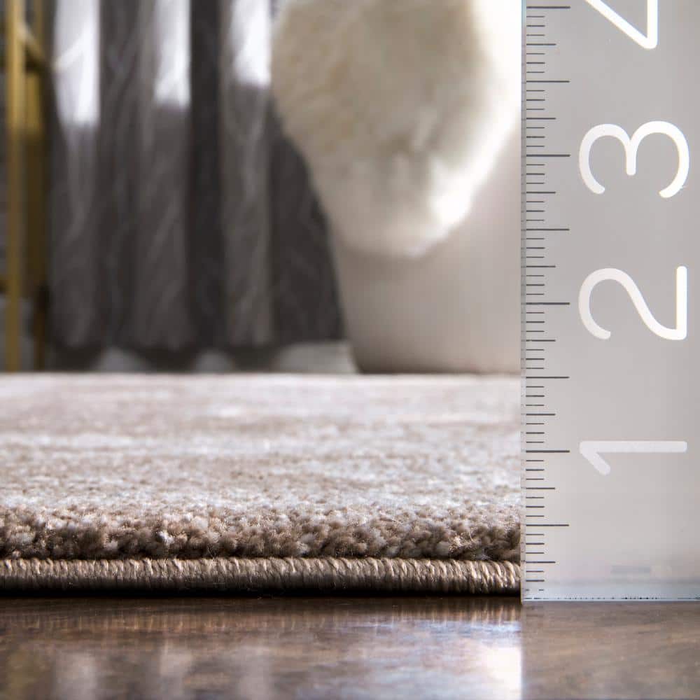 Lindsay Vintage Brown Synthetic 5' x 7' Easy-Care Area Rug