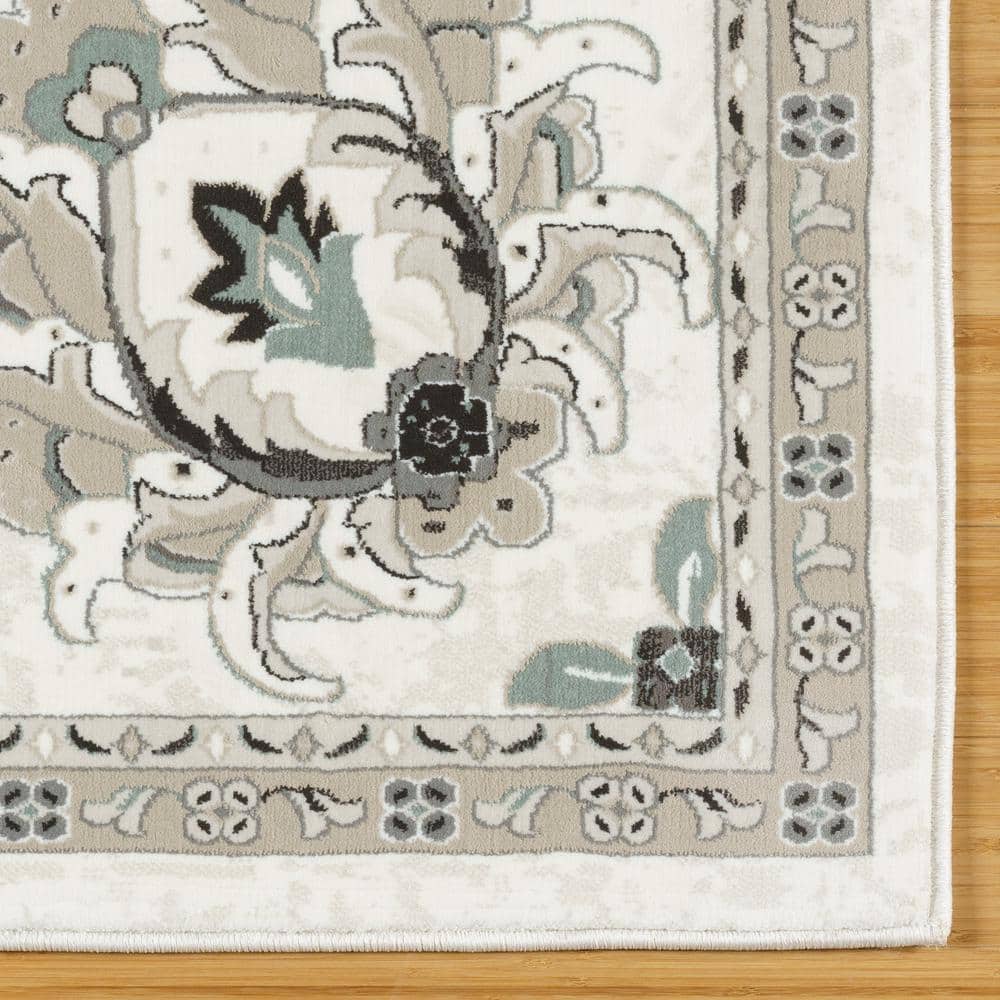 Ivory and Gray Tufted Synthetic 6' x 9' Area Rug