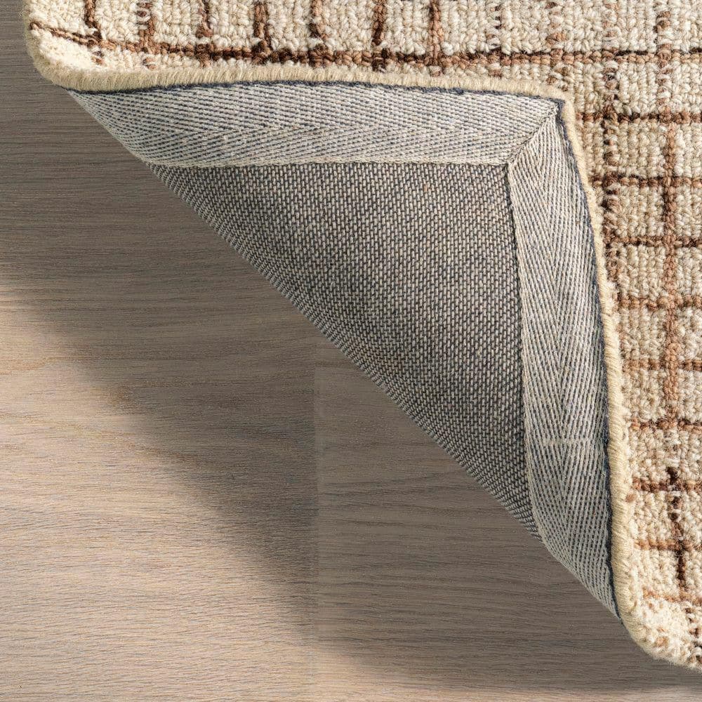 Cream and Beige Tufted Wool 6' x 9' Area Rug