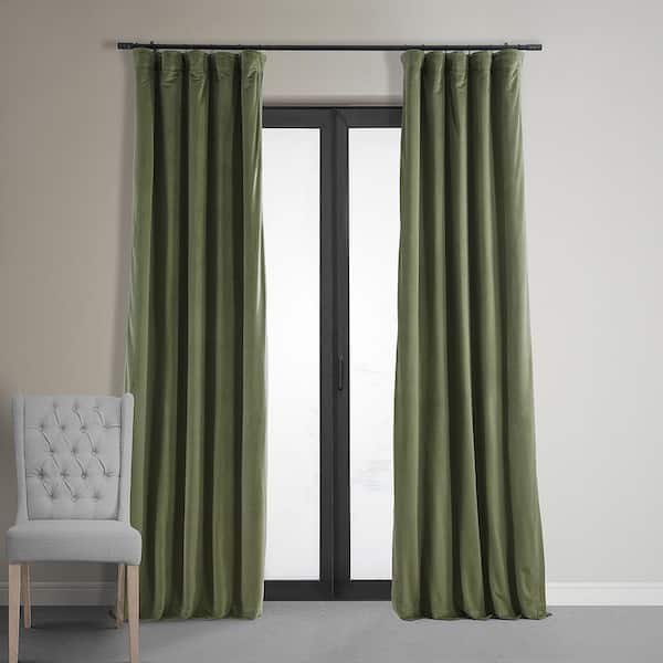 Exclusive Fabrics & Furnishings Hunter Green Velvet Solid 50 in. W x 108 in. L Lined Rod Pocket Blackout Curtain
