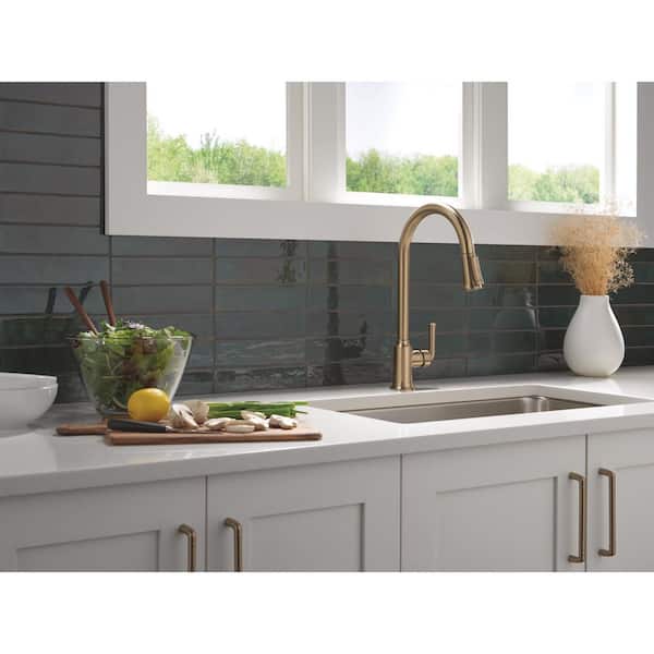 Tolmac Single Handle Pull Down Sprayer Kitchen Faucet in Champagne Bronze