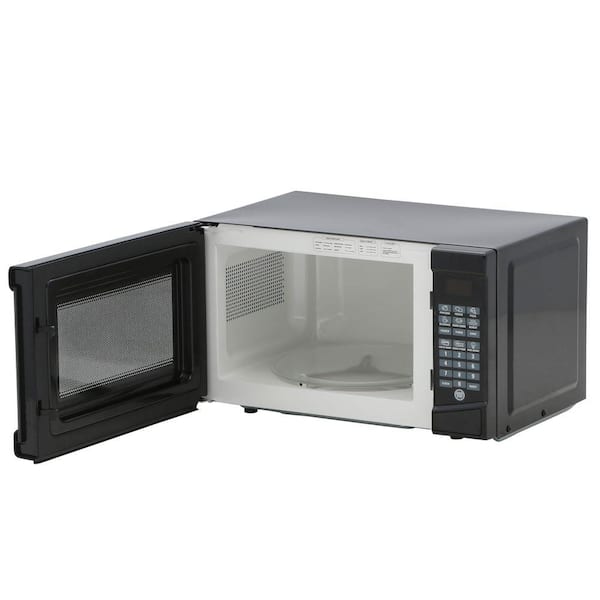https://images.thdstatic.com/productImages/14dc6c8e-5fdc-46d7-836e-ceda8bcecceb/svn/black-rca-countertop-microwaves-rmw733-black-e1_600.jpg