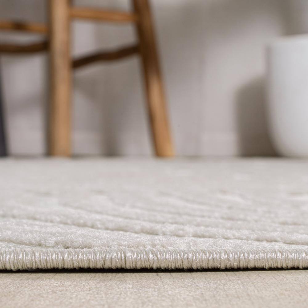 Cream and Ivory 8' x 10' High-Low Striped Synthetic Area Rug