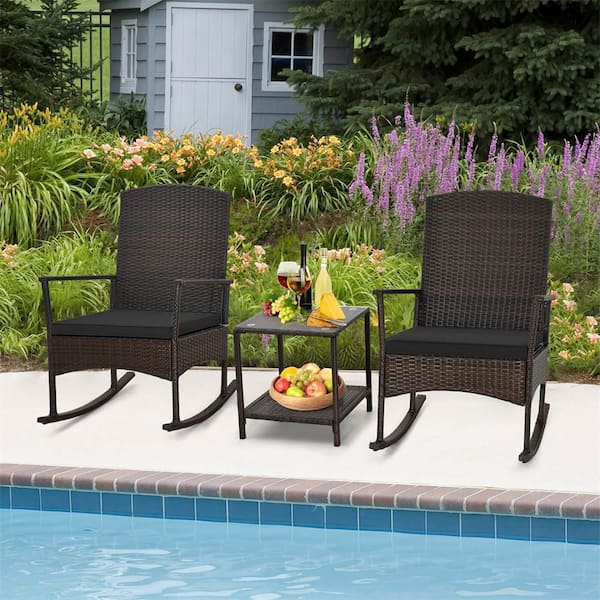 Costway 3 Piece Wicker Outdoor Rocking Chair with 2-Tier Coffee Table Black Cushion