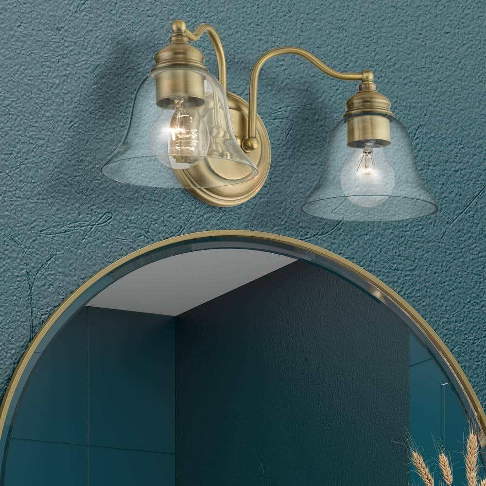 Antique Brass Dual-Light Vanity with Hand-Blown Clear Glass Shade