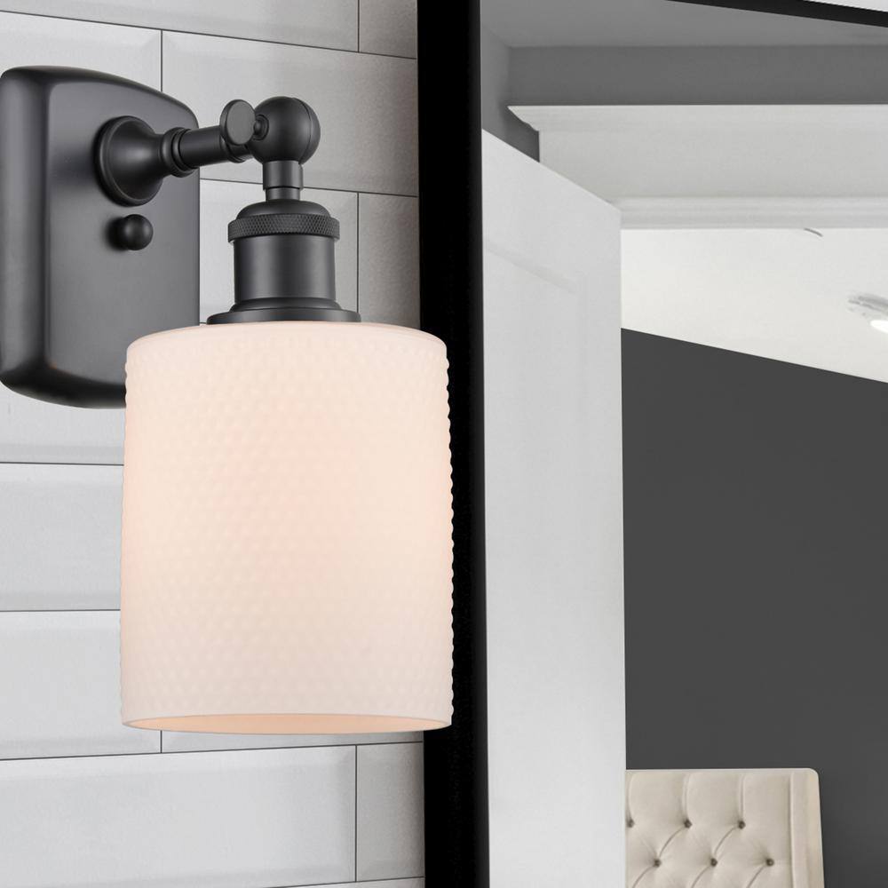 Matte Black and White Glass Adjustable Wall Sconce