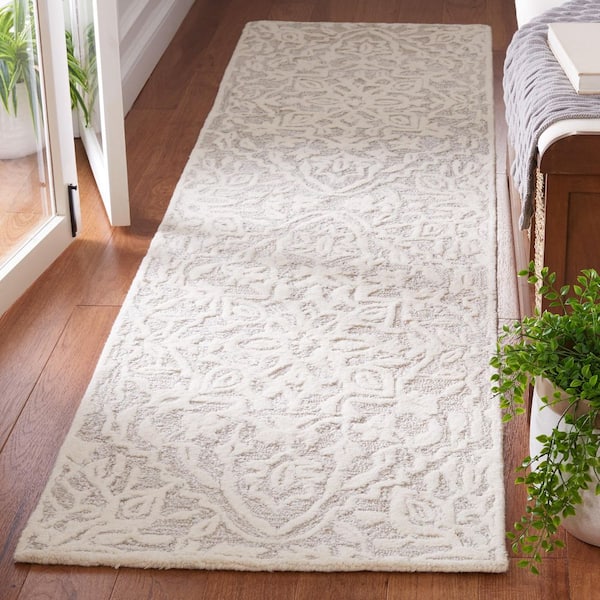 Antiquity 2 ft. x 9 ft. Silver/Ivory Textured Medallion Runner Rug