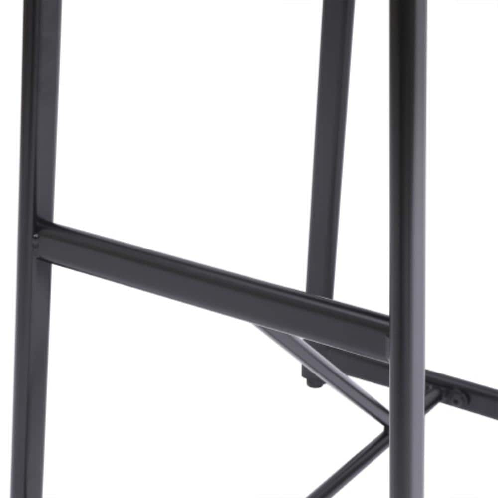 Close-up of the geometric black metal frame structure of a bar stool.