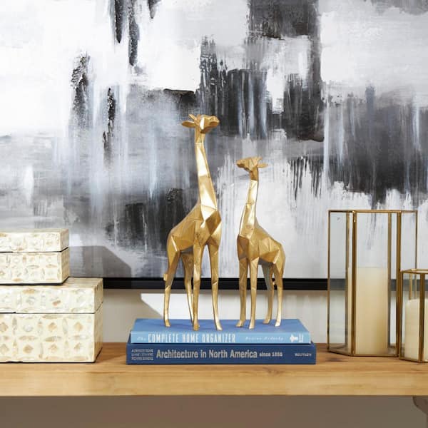 CosmoLiving by Cosmopolitan Gold Polystone Giraffe Sculpture (Set of 2)
