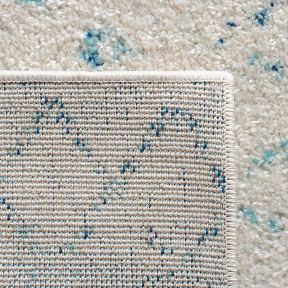 Elegant Ivory/Aqua Synthetic 9' x 12' Hand-Knotted Area Rug