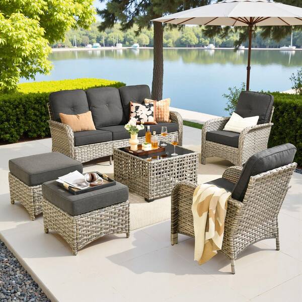 Eliza 6-Piece Outdoor Wicker Conversation Sofa Seating Set for Patio, with Ottoman, Black Cushions and Coffee Table.