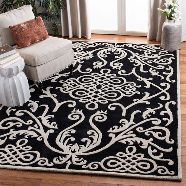 Soho Black/Ivory 5 ft. x 8 ft. Solid Floral Area Rug