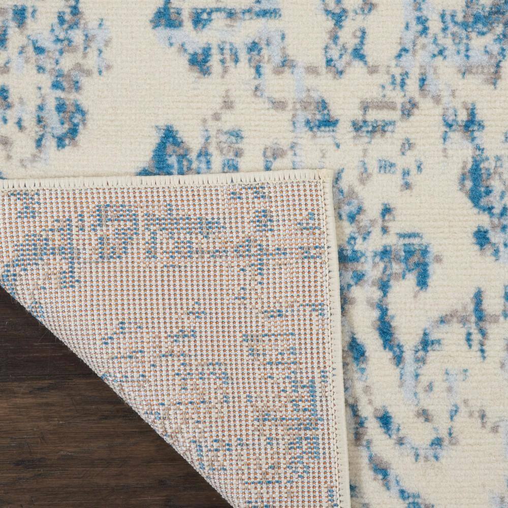 Nourison Jubilant Ivory & Blue Hand-Knotted Spot Rug, 2' x 4'