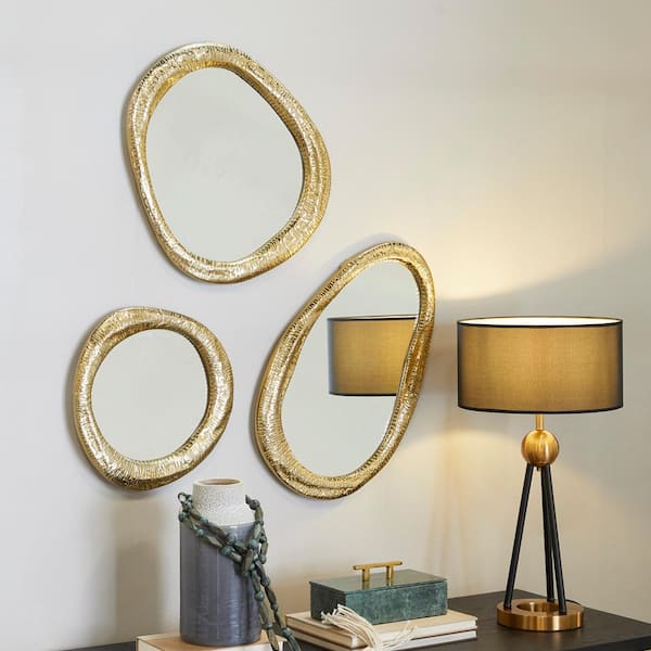 Litton Lane 23 in. x 15 in. Round Framed Gold Abstract Wall Mirror (Set of 3)