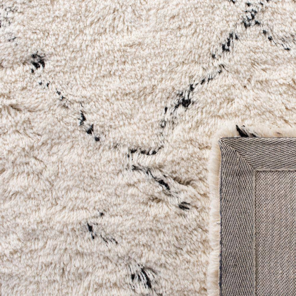 Ivory and Black Hand-Tufted Wool Shag Area Rug, 5' x 8'