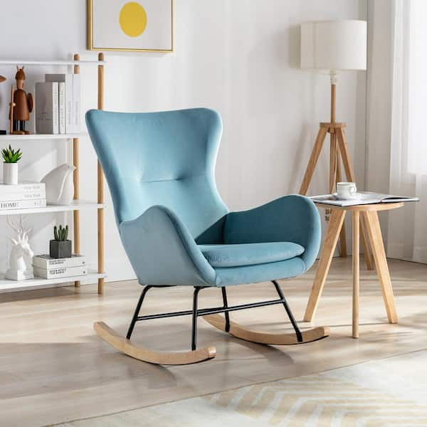 blue upholstered rocking chair