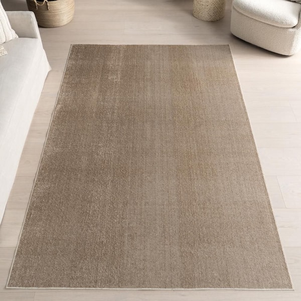 Argelia Solid Machine Washable Beige 7 ft. x 9 ft. Indoor Area Rug