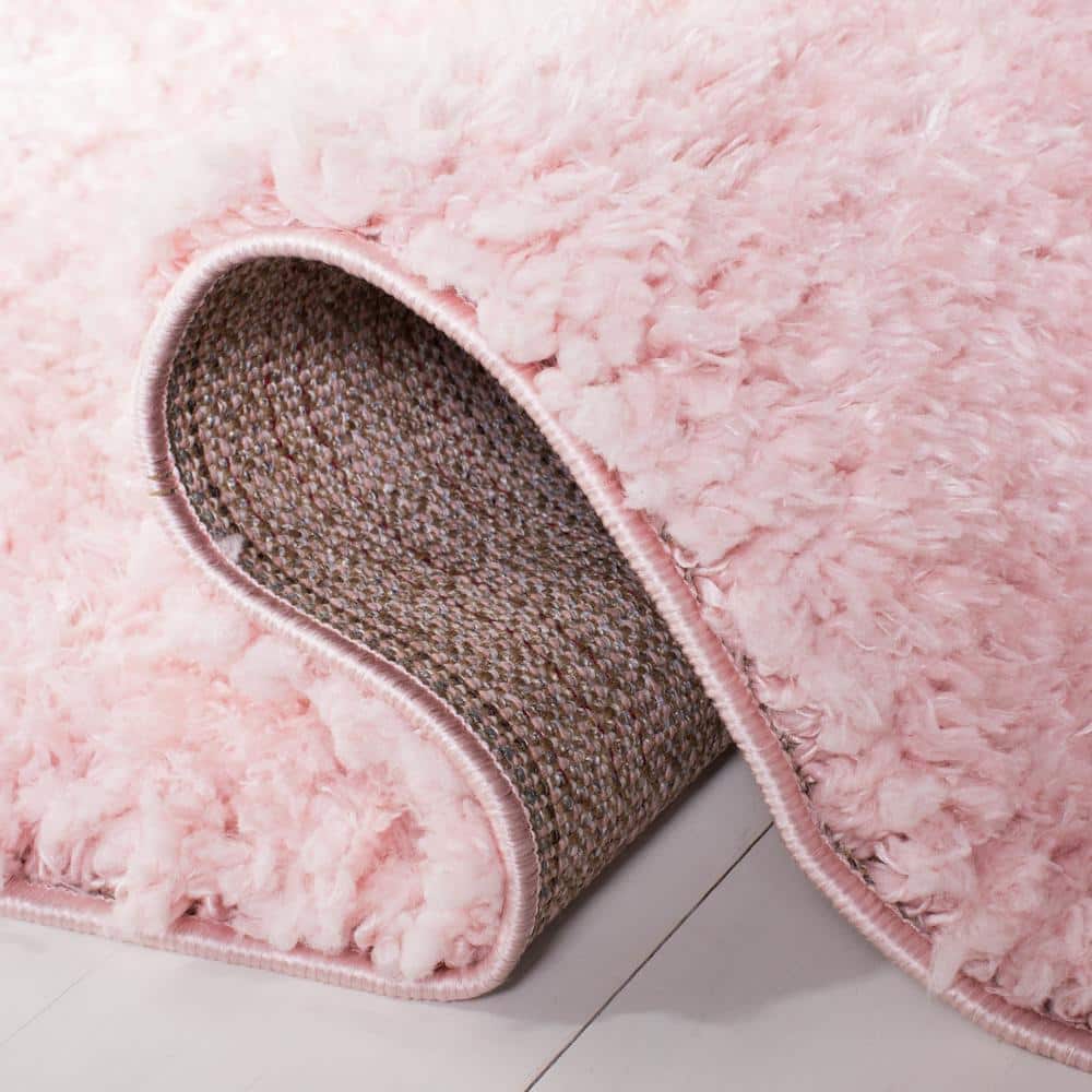 Blush 9' x 12' Solid Shag Wool and Synthetic Rug