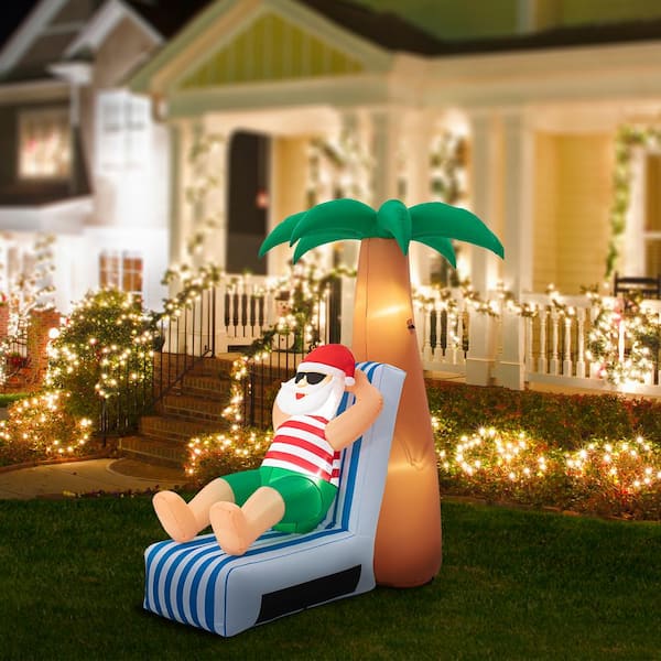 6 ft. H 2 ft. Inflated width Lighted Santa Under Coconut Tree Decor