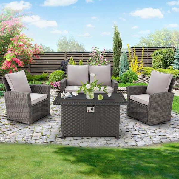 Unbranded 4 Piece Wicker Patio Conversation Set with 44 In. 50,000 BTU Black Fire Pit Table/Wind Guard in Gray Cushion