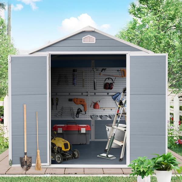 Outdoor 6 ft. W x 8 ft. D Resin Shed with Floor, Window and Lockable Doors Gray (48 sq. ft. )