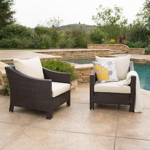 Outdoor Brown Metal Lounge Chair with CushionGuard and Beige Cushion