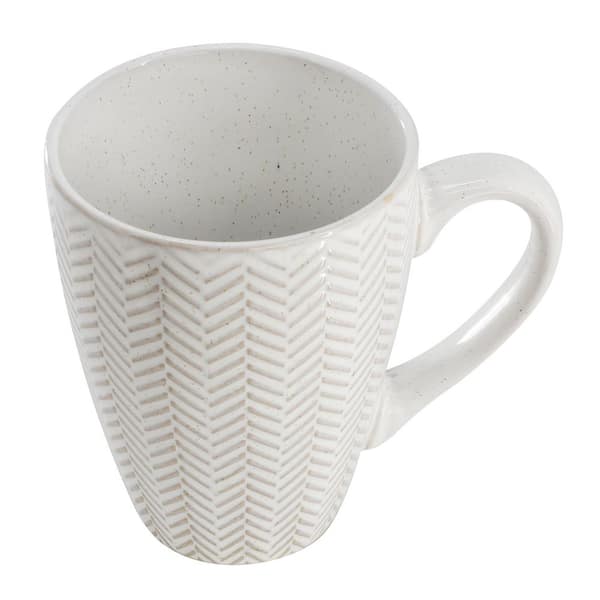 Gibson Elite Earlhart 4 Piece 16 Ounce Stoneware Assorted Pattern Mug Set in White
