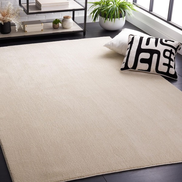 Revive 7 ft. x 9 ft. Ivory Solid Color Area Rug