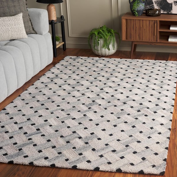 Genre 6 ft. x 9 ft. Gray/Brown Spotted Lattice Area Rug