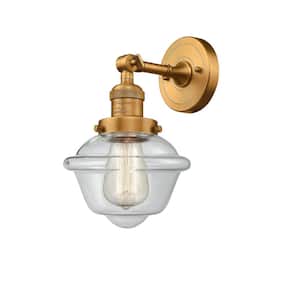 Franklin Restoration Small Oxford 7.5 in. 1-Light Brushed Brass Wall Sconce with Clear Glass Shade
