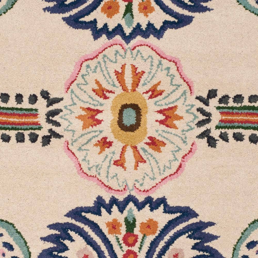 Bella Ivory and Blue Round Hand-Tufted Wool Area Rug